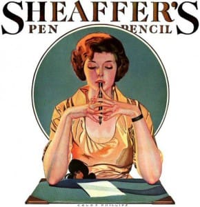 Woman holding pen, Sheaffer's vintage advertisement.