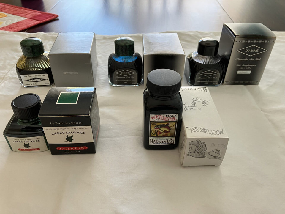 Various skincare and cosmetic products arranged on a table.